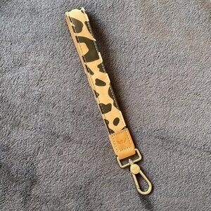 Consuela Bam Bam wristlet strap